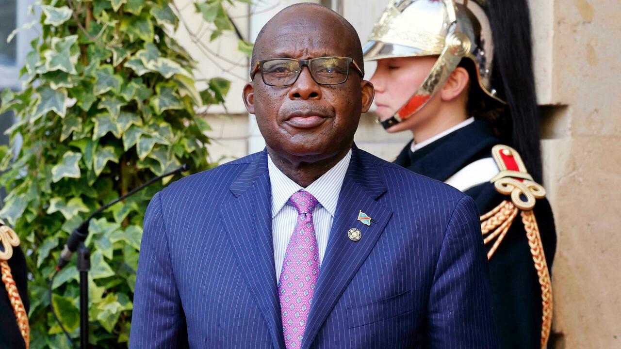Christophe Lutondula Abala, Minister of Foreign Affairs of the Democratic Republic of the Congo arrives for the International conference on Libya at the Maison de la Chimie in Paris on November 12, 2021. (Photo by Ludovic MARIN / AFP)