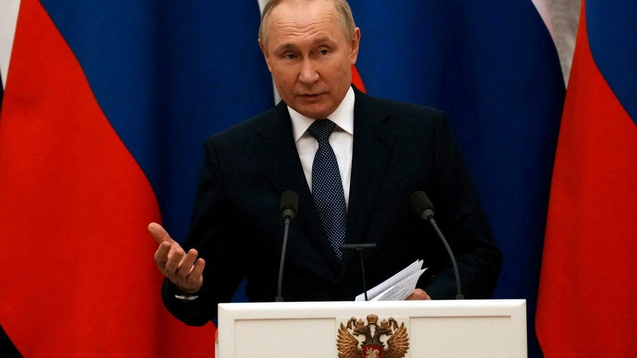 Russian President Vladimir Putin gestures during a press conference with French President Emmanuel Macron, in Moscow, Russia, February 7, 2022. Thibault Camus/Pool via REUTERS