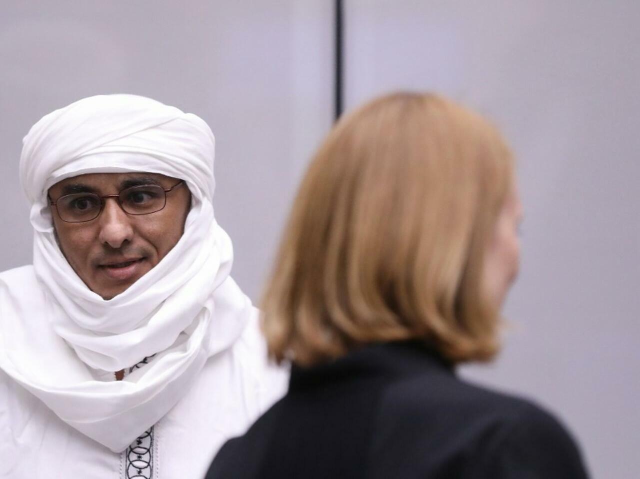 Malian Muslim militant Al-Hassan Ag Abdoul Aziz Ag Mohamed Ag Mahmoud attends his trial at the International Criminal Court (ICC) in The Hague, The Netherlands, on July 8, 2019. – Judges are to determine whether there is enough evidence for a Malian jihadist to face trial for demolishing Timbuktu’s fabled shrines, as well as for rape, torture and sex slavery. (Photo by EVA PLEVIER / ANP / AFP) / Netherlands OUT