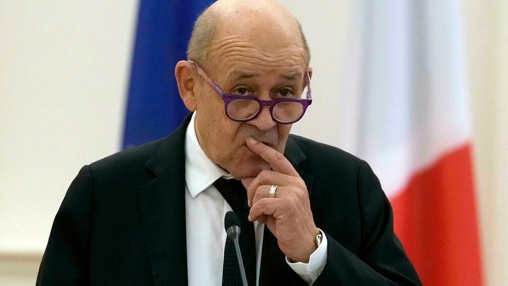 French Foreign Minister Jean-Yves Le Drian makes statements after a bilateral meeting with his Greek counterpart Nikos Dendias, in Athens, Greece, Friday, Nov. 19, 2021. Talks focused on bilateral relations, developments in the eastern Mediterranean, the Cyprus issue and developments in Libya. (AP Photo/Thanassis Stavrakis)