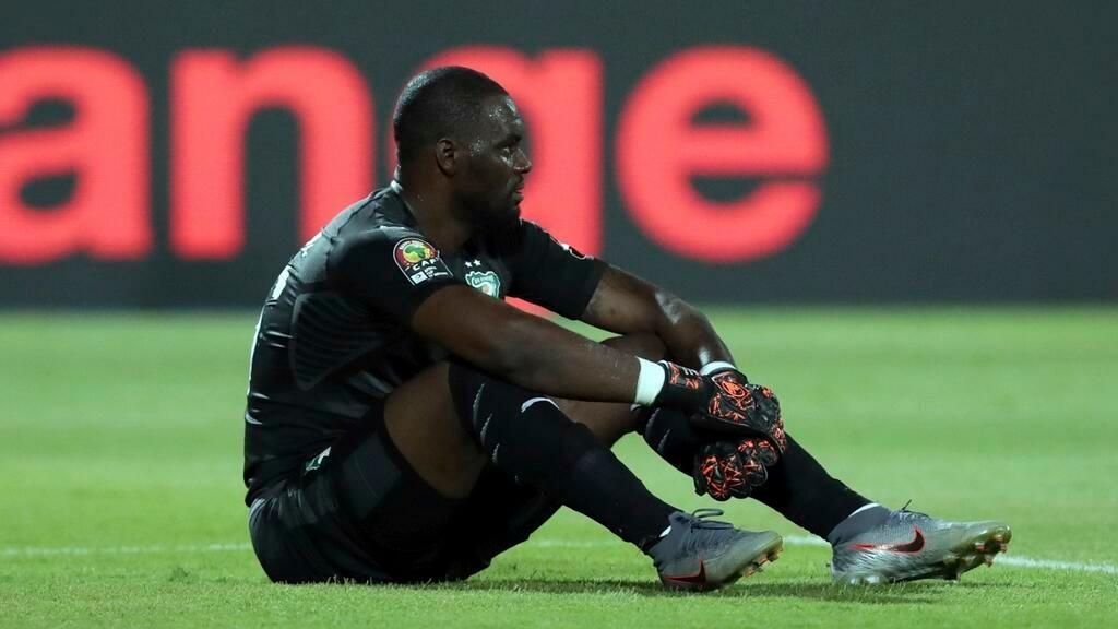Ivory Coast goalkeeper Guelassiongnon Gbohouo reacts after Namibia’s Joslin Kamatuka scoring his side’s opening goal during the African Cup of Nations group D soccer match between Namibia and Ivory Coast in 30 June Stadium in Cairo, Egypt, Monday, July 1, 2019. (AP Photo/Hassan Ammar)