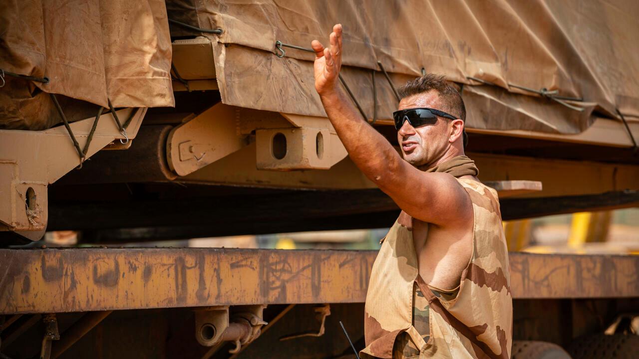 This photo provided Tuesday April 19, 2022 by the French Army shows a French soldier of the Barkhane forces directing operations before France hands over the Gossi base to Malian forces, on April 9, 2022 in Gossi, Mali. (Katucya Barolin, French Army via AP)