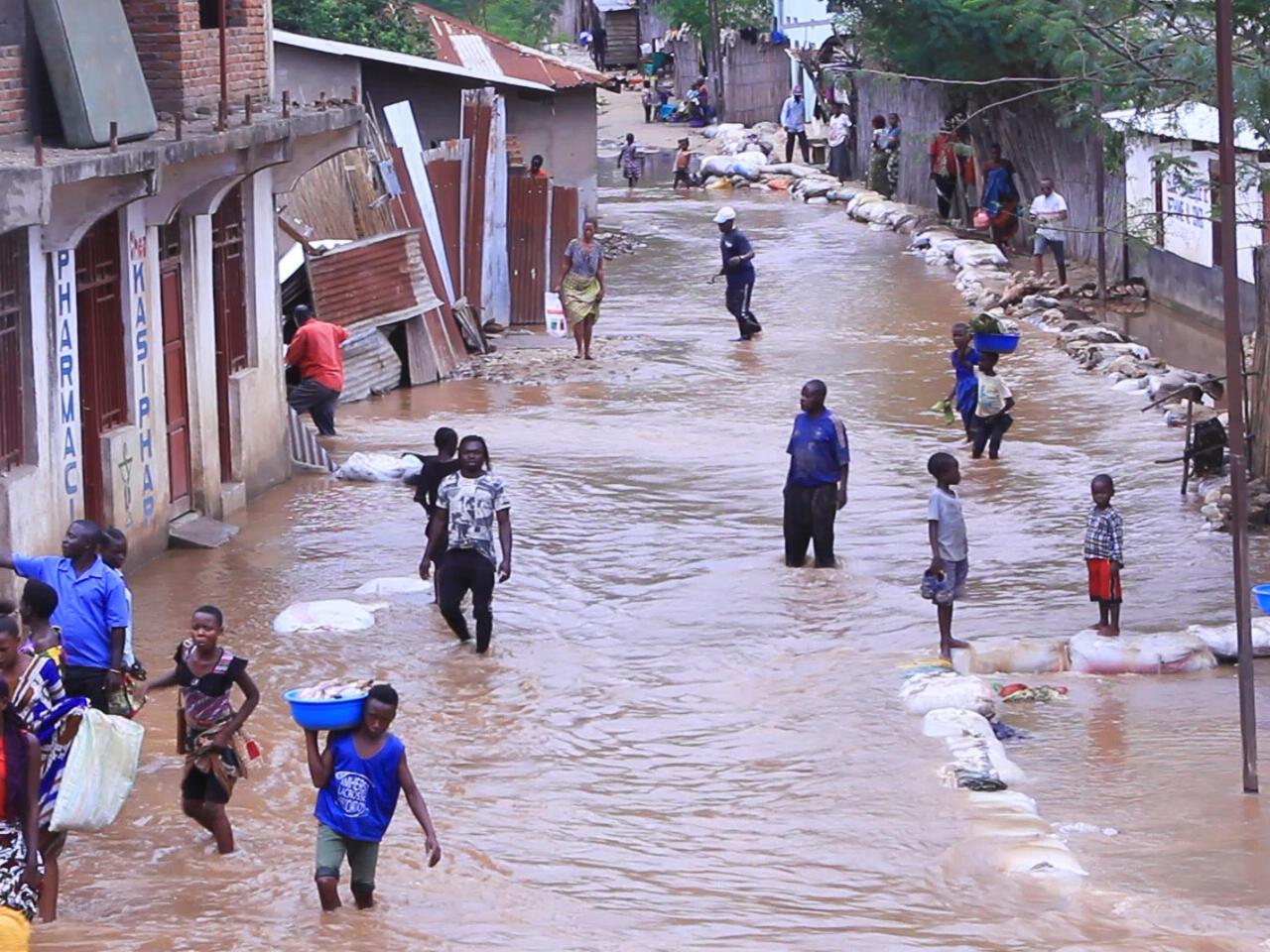 Residents walk along a flooded neighbourhood in Uvira, South Kivu Province, Democratic Republic of Congo April 21, 2020. REUTERS/Crispin Kyalangalilwa NO RESALES. NO ARCHIVES